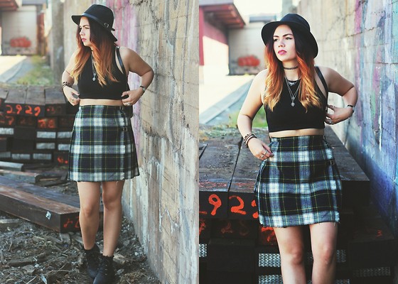 Crop top and plaid skirt