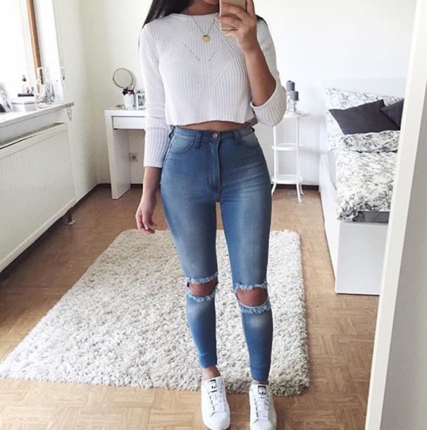 White long sleeved crop top and jeans